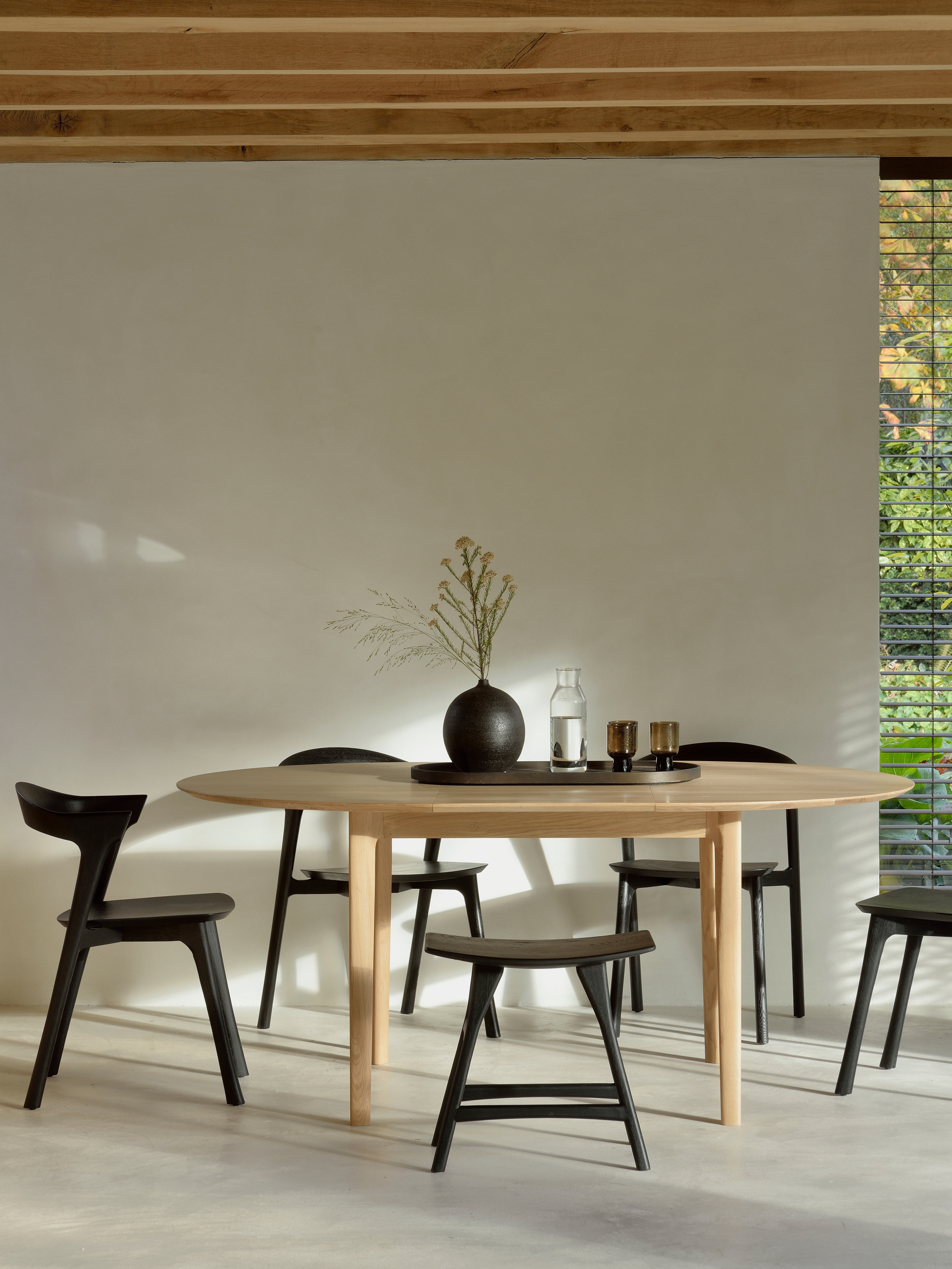 34870 44b1b22c27 51527 Oak Bok Round Extendable Dining Table 51491 Oak Bok Black Chair 53040 Oak Osso Black Stool 1 Hq Portrait