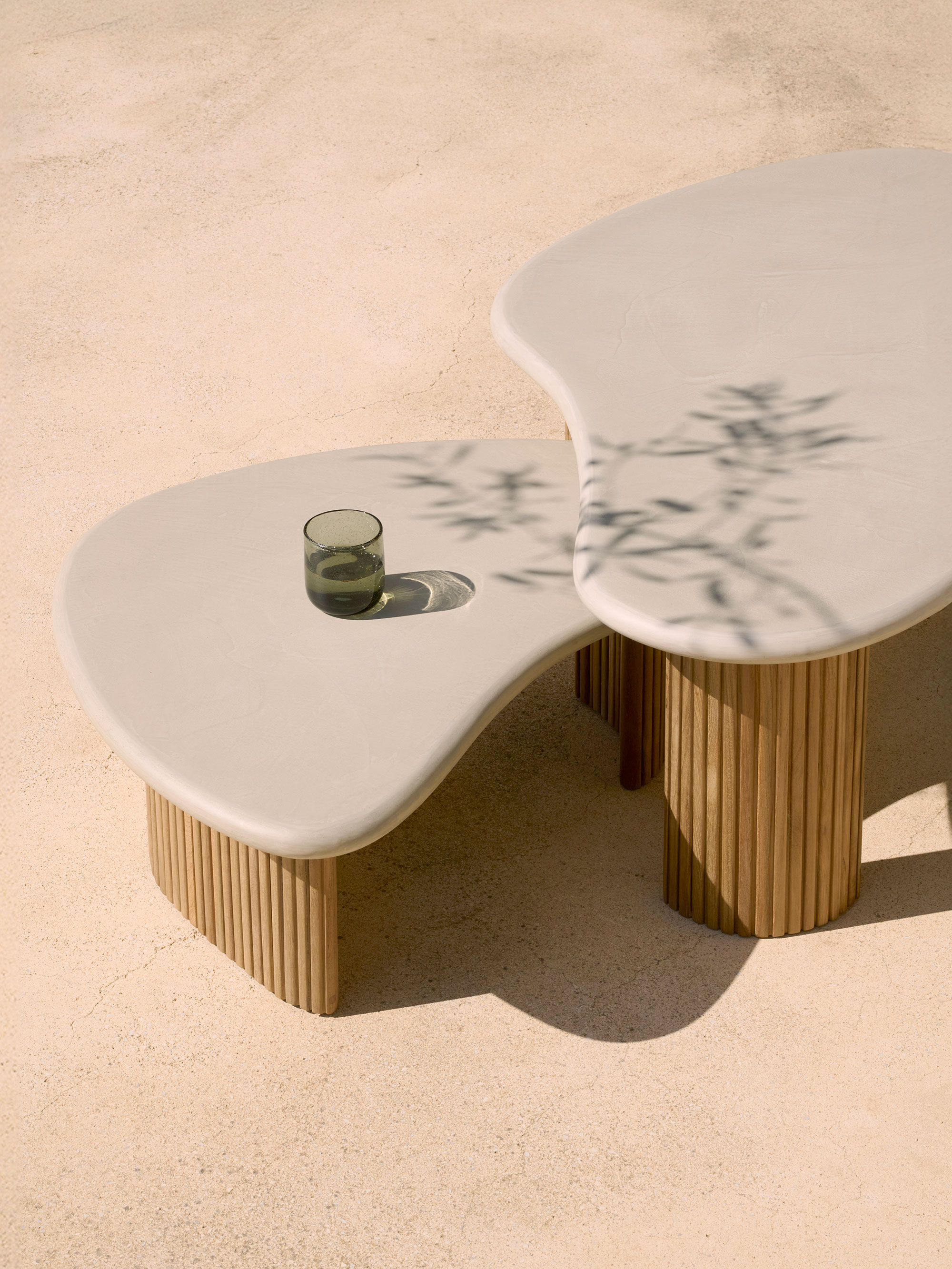 57536 C4077c5415 11237 11238 Boomerang Outdoor Coffee Table Concrete Top Reclaimed Teak Base Pebble Shape 2 Hq Portrait